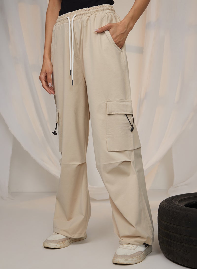 PINACOLADA Women's Beige Solid Cargo Parachute Trousers For Casual Wear | Mid-Rise | 4 Pockets | Drawstring Closure | Cargo Pants Designed With Comfortable Fit For Woman & Girls - Image 1